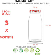Dekorative Milchflaschen aus Glas mit rotem