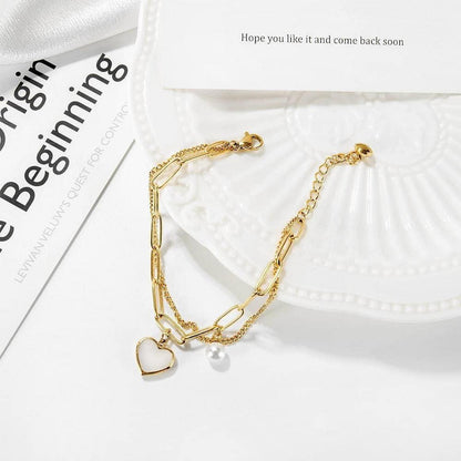 OSTAN Damen Armband mit Herz Anhänger aus Edelstahl