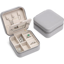 Kleine Schmuckbox mit Spiegel und Lederetui für