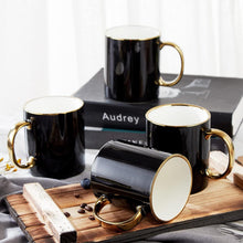 Schwarzes Kaffeetassen-Set mit goldenen Zierleisten - 4er Pack
