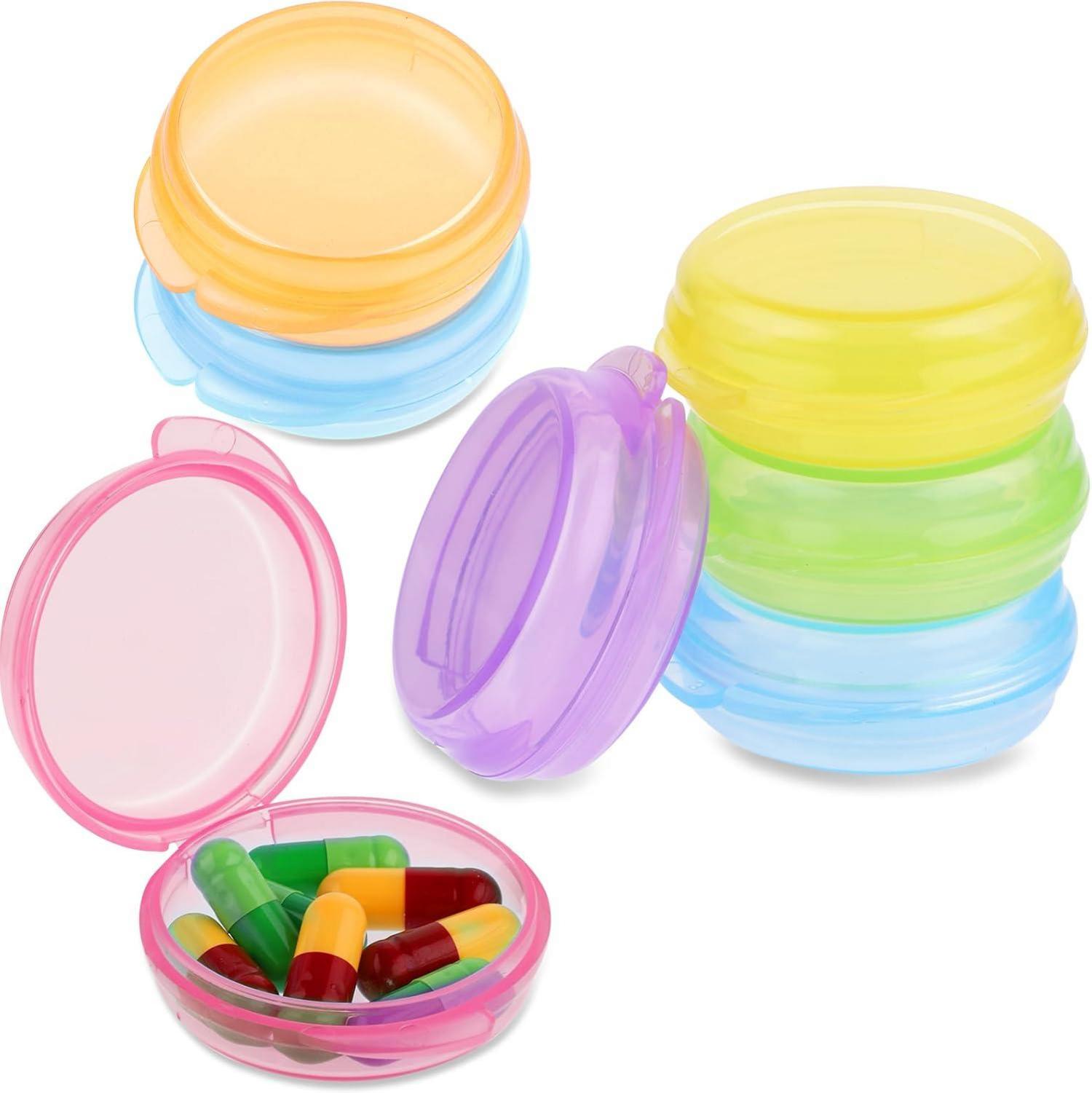 Set mit 7 kleinen Pillendosen Tragbarer