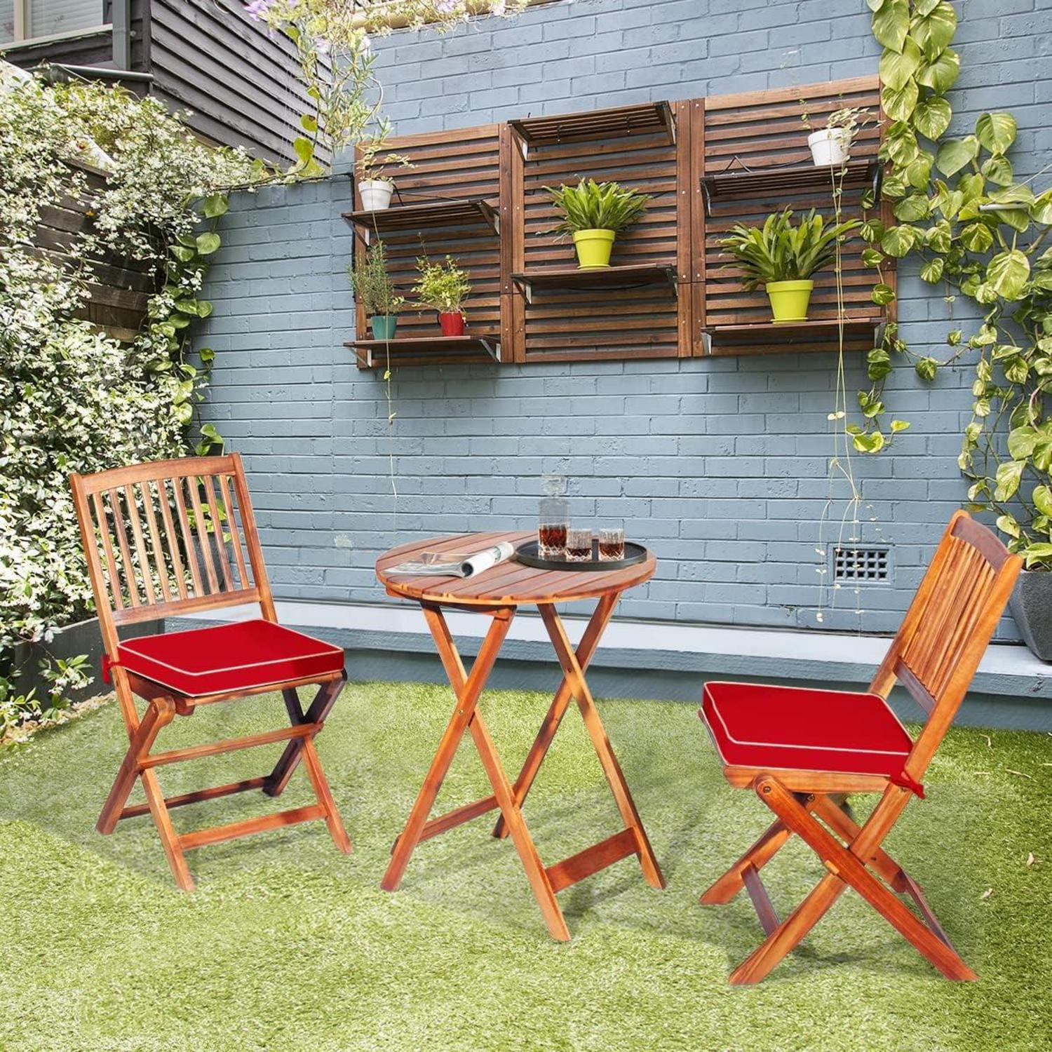 Gartenmöbel Set Akazienholz klappbar Rundtisch Stühlen Kissen Rot