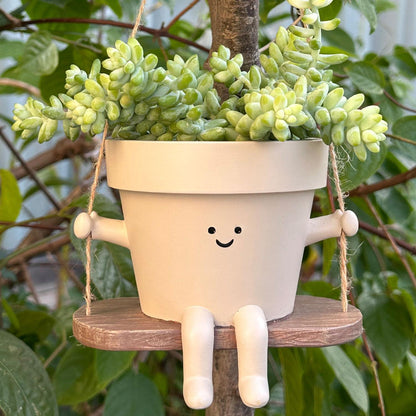 Hängender Blumentopf mit Schaukelgesicht und Entwässerungsloch