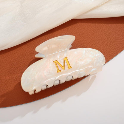 LILIE&WHITE Damen Haarklammer Buchstabe M Acryl Beige Gold
